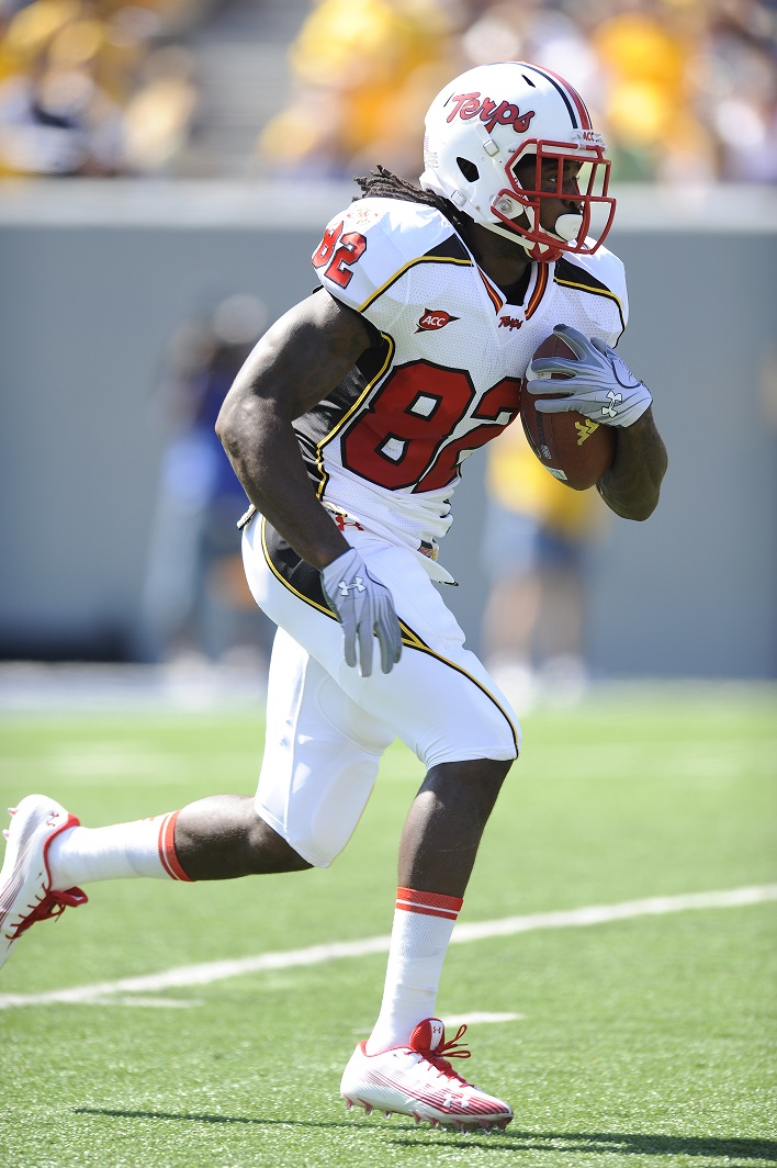 Torrey Smith carries the ball for Maryland